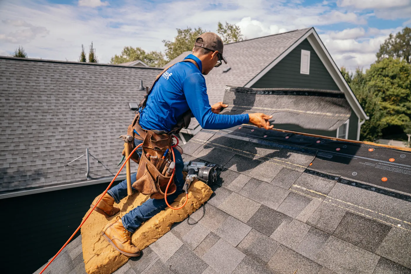 Emergency tarping on a Willow Pointe roof
